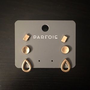 Gold stud earrings